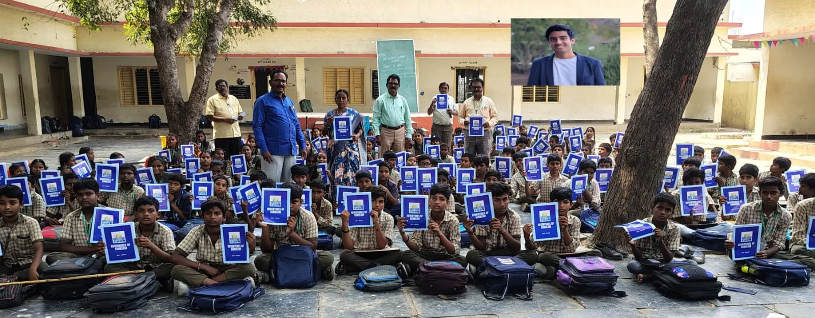 Students holding up copies of Adventures of Sunbeam